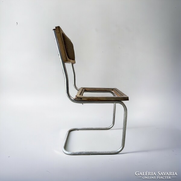 Retro, loft, industrial design tubular frame chair