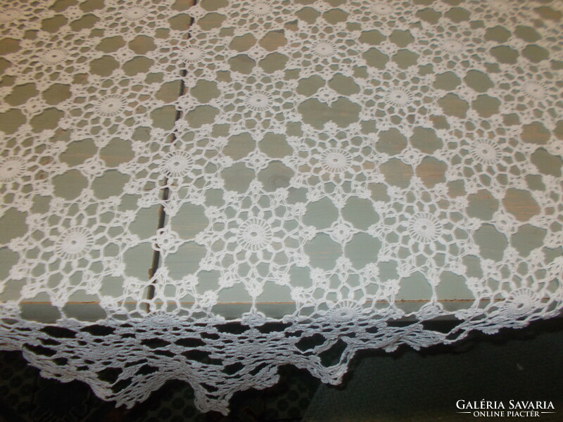 Beautiful crocheted lace tablecloth