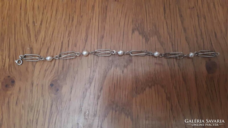 Antique silver bracelet with pearls, 21 cm long, in good condition for its age
