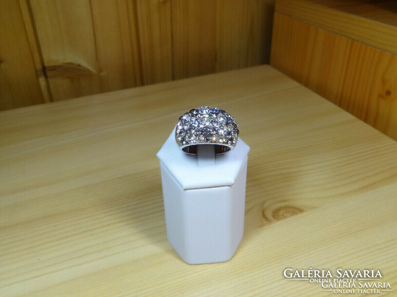 Medical steel ring with lots of crystal stones, silver color, very beautiful, shiny. Stable ring.