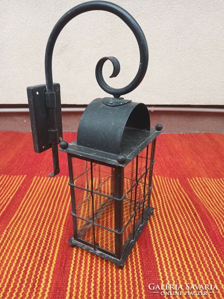 Vintage wrought iron wall lamp. Negotiable.