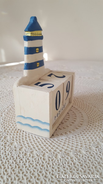 Wooden perpetual calendar with lighthouse