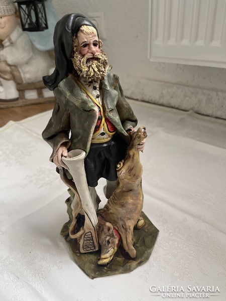 Antique detail rich, beautifully painted Italian hunter statue