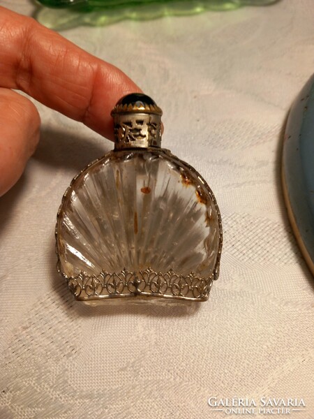 Antique perfume bottle with metal overlay