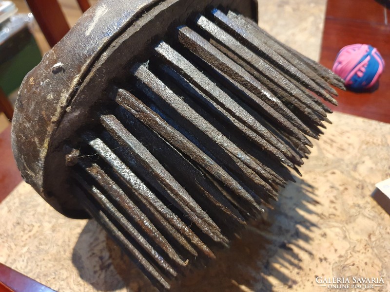 A hemp comb in a medieval comb or carding device