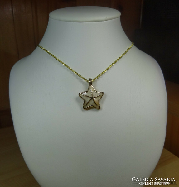 Fire enamel gold-colored starfish pendant necklace with incised chain links.