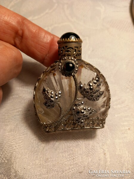 Antique perfume bottle with metal overlay