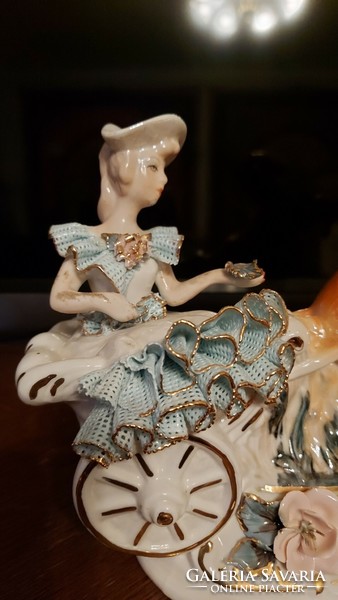 Large porcelain horse tooth. Lady in baroque dress