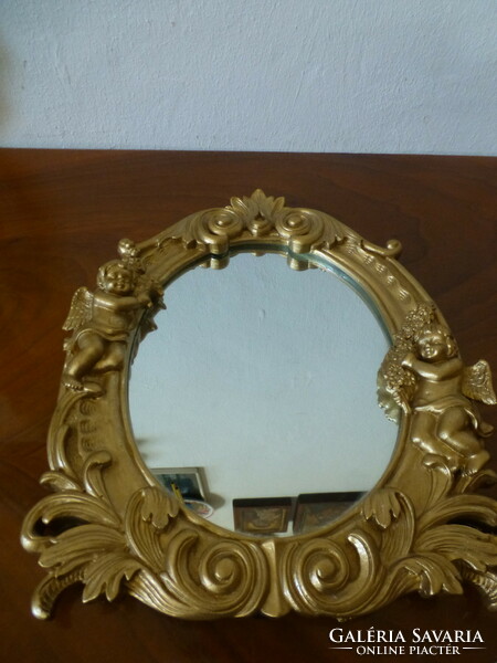 Wall or standing mirror with gilded putty, angelic