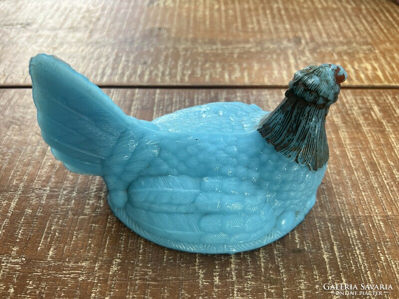 Turquoise glass hen.