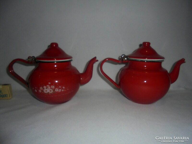 Two red, enamel, spouted, spherical coffee pourers and warming jugs - together