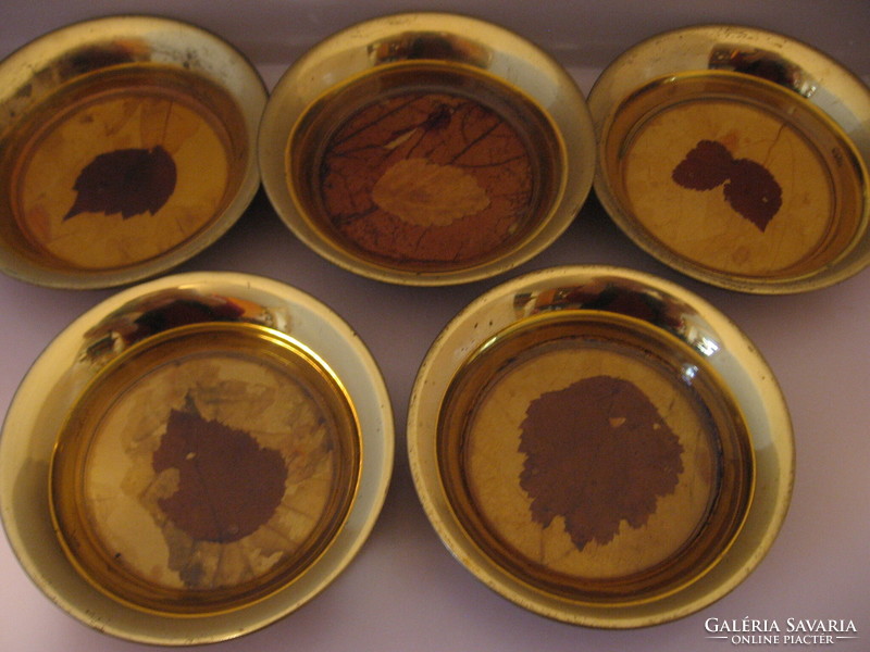 5 Copper colored metal bowls with leaf inside