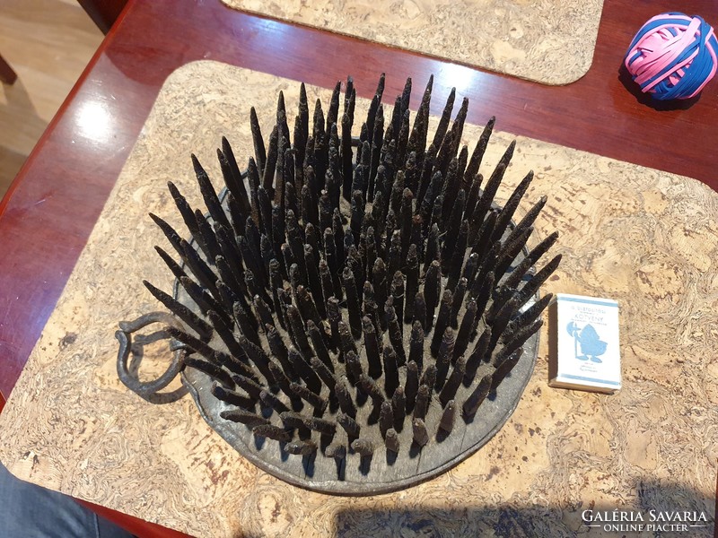 A hemp comb in a medieval comb or carding device