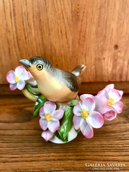 Herend bird on a flowering branch