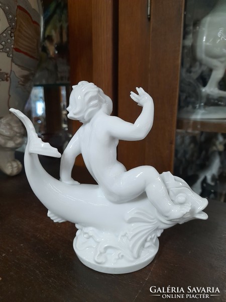 German, Germany Rosenthal putto sitting on a fish, child figural sculpture, porcelain figure. G. Opel. 14.5 Cm.