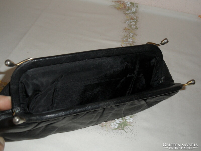 Older black leather theater bag