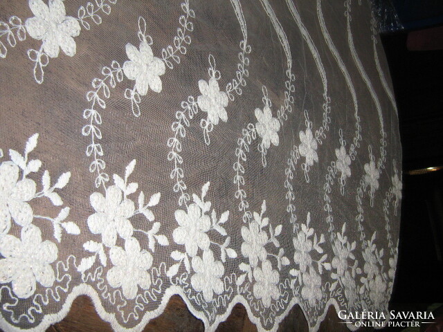 Floral curtain embroidered in beautiful vintage snow-white fabric