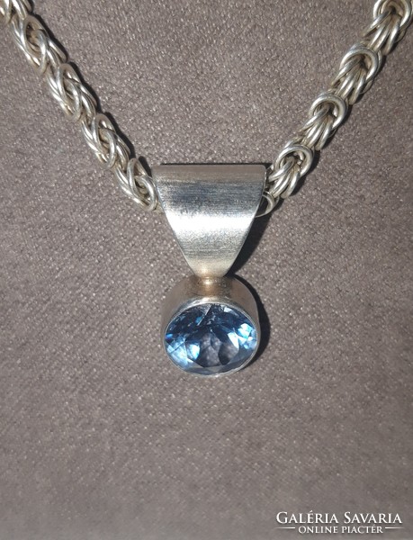 Lor designer silver pendant with a deep fire topaz stone, on a silver rose chain