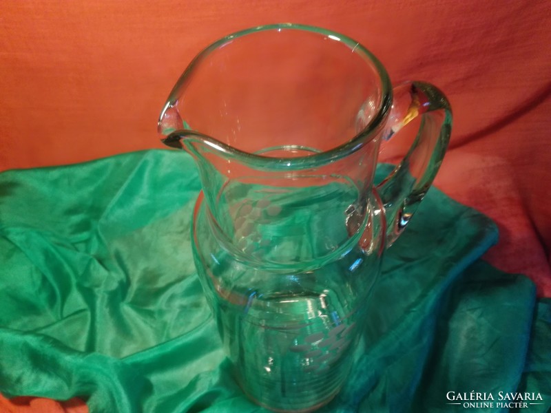 Glass wine jug.