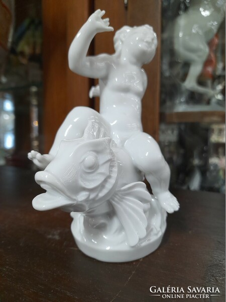 German, Germany Rosenthal putto sitting on a fish, child figural sculpture, porcelain figure. G. Opel. 14.5 Cm.