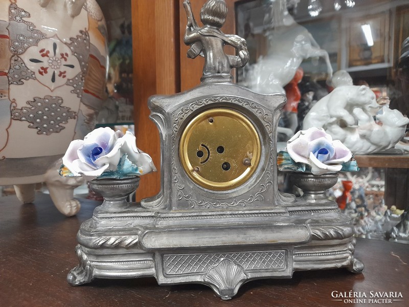 Italian baroque puttos, porcelain rose table, fireplace mechanical clock.