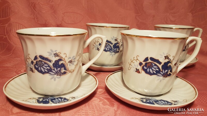 6 never used, blue painted, gilded porcelain mugs, 6 small plates with handles