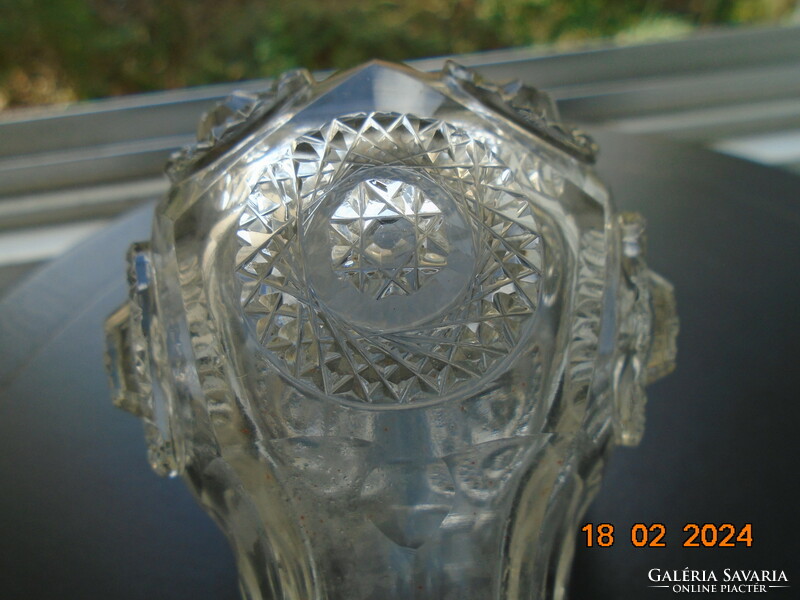 Antique faceted parfum glass with raised raised rosettes and gilded fittings