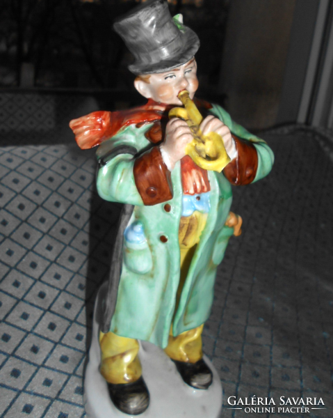 Old porcelain marked musician (trumpeter) figure