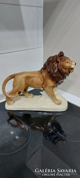 Antique large porcelain lion statue