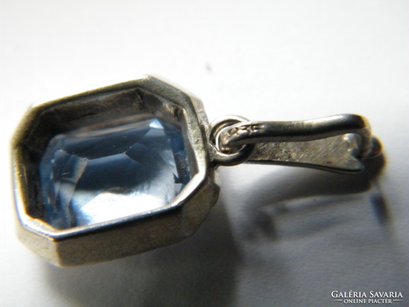 Antique silver pendant with blue stones