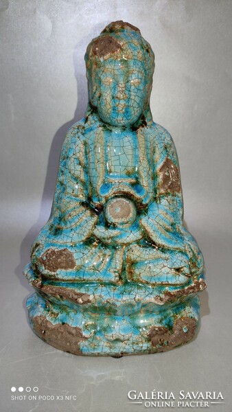 Turquoise colored majolica glazed ceramic sculpture