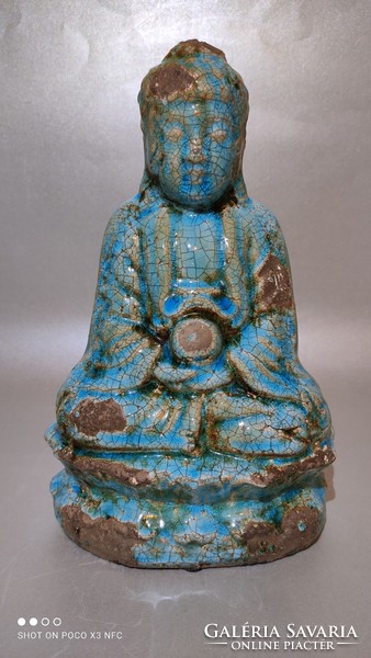 Turquoise colored majolica glazed ceramic sculpture