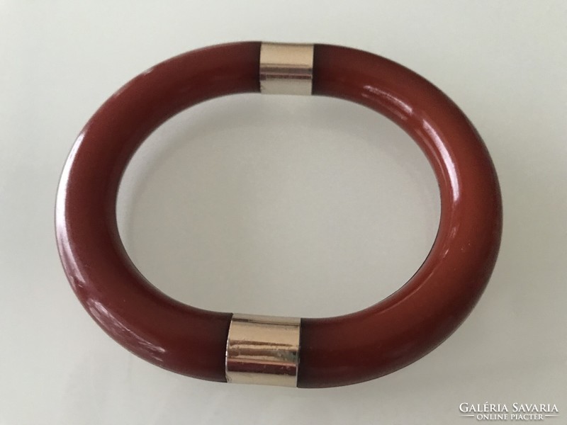 Retro vinyl or plastic bracelet in rust brown color with gold-plated insert