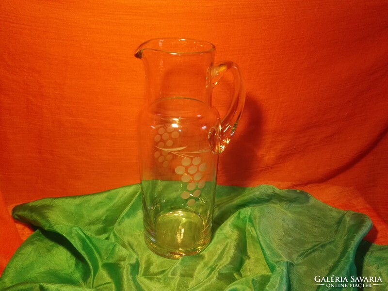 Glass wine jug.
