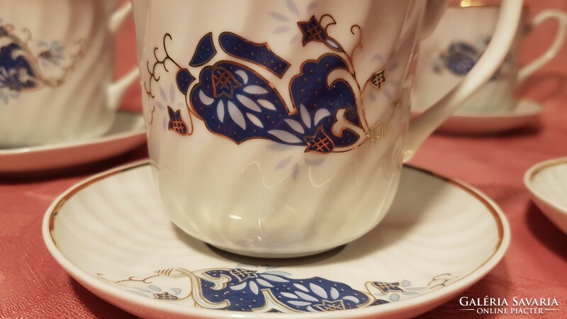 6 never used, blue painted, gilded porcelain mugs, 6 small plates with handles