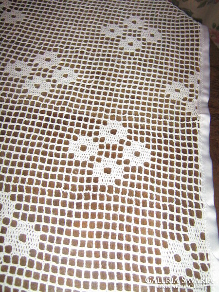 Antique white crocheted silk floral tablecloth