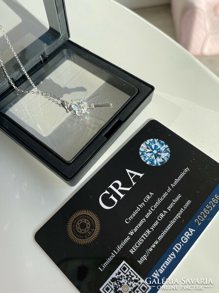 New sparkling key pendant with moissanite diamond.