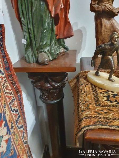2 pedestals carved from solid wood. Very nice decorative pieces. They are 110 cm high