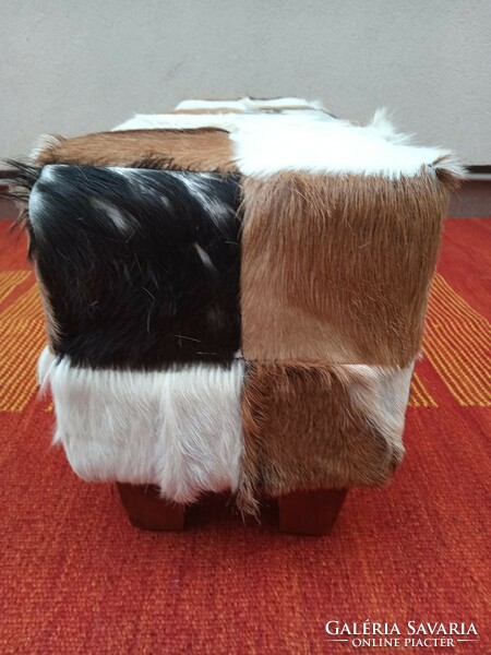 Vintage goatskin bench.