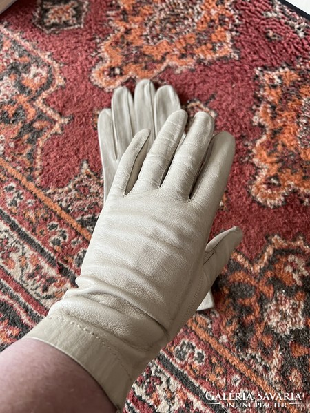 Hand-stitched vintage cream-colored leather women's gloves