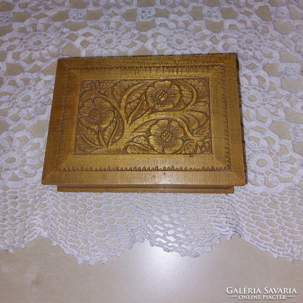 Carved wooden box decorated with a retro folk motif