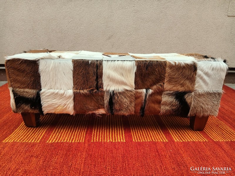 Vintage goatskin bench.