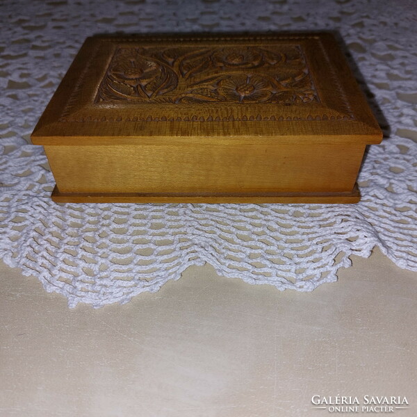 Carved wooden box decorated with a retro folk motif