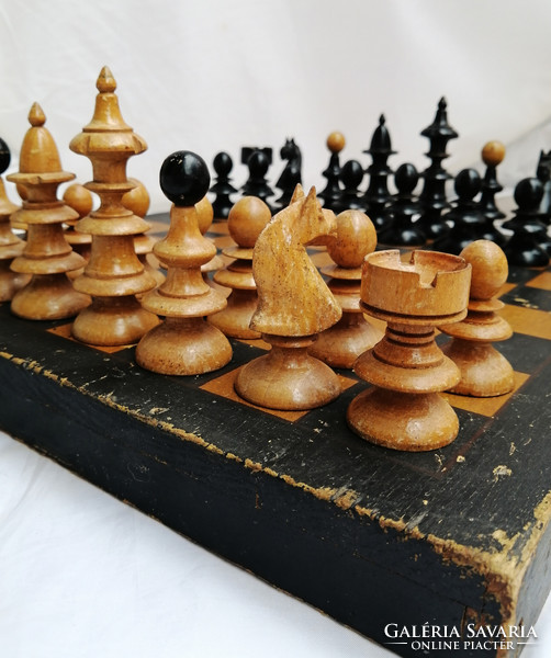 Old wooden chess set with board