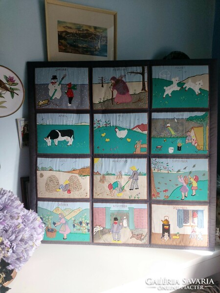 The pictures show the months of the year on a charming, almost 1x1 meter huge needlework board
