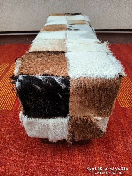 Vintage goatskin bench.