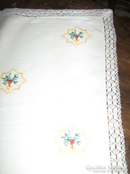 Beautiful hand-embroidered damask tablecloth with a lace edge