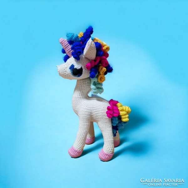 Hand-crocheted unicorn using the amigurumi technique
