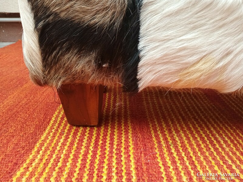 Vintage goatskin bench.