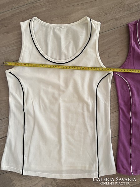 2 sleeveless sports tops, tops together